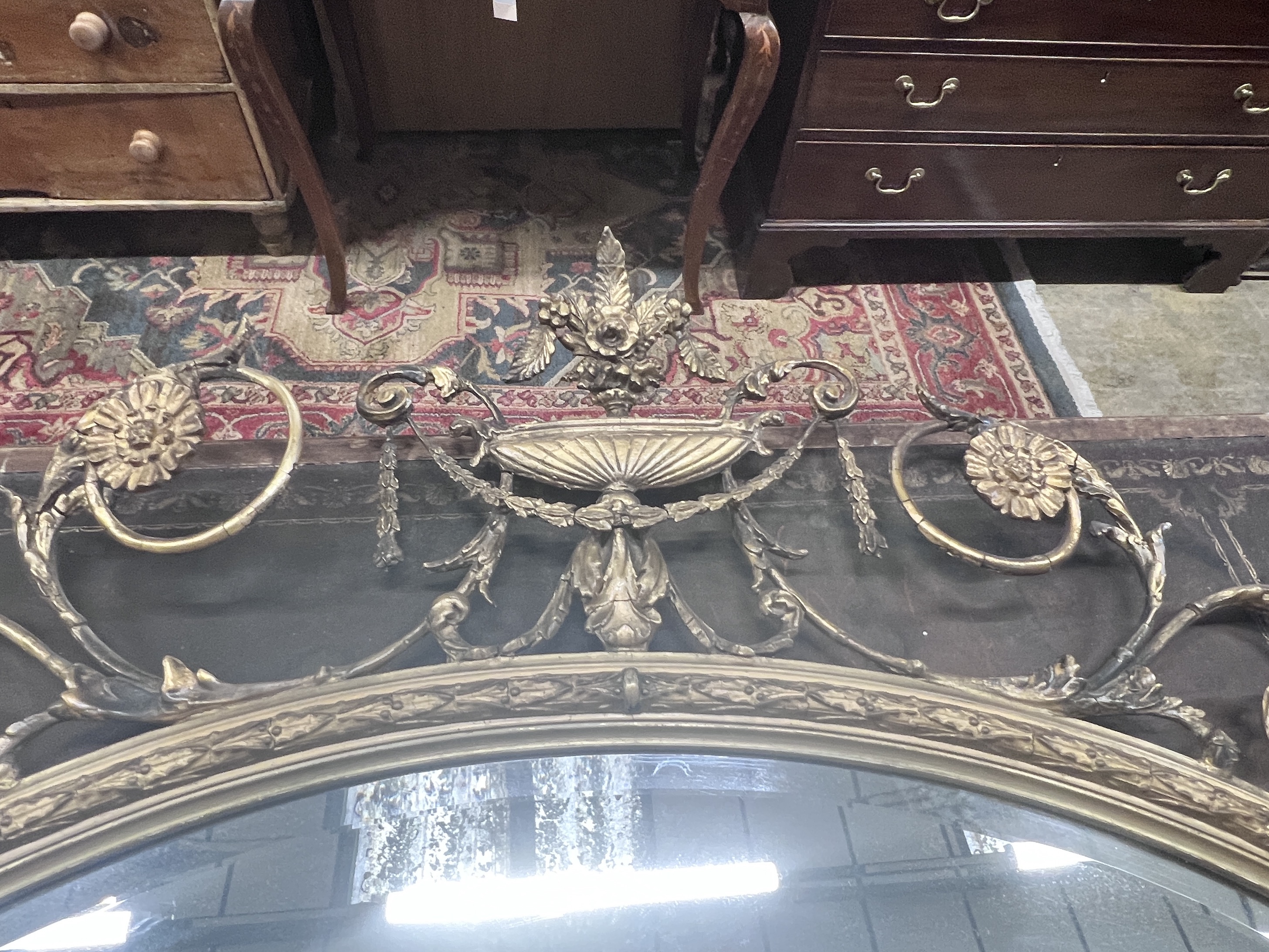 An Adam revival giltwood and gesso wall mirror, width 119cm, height 115cm